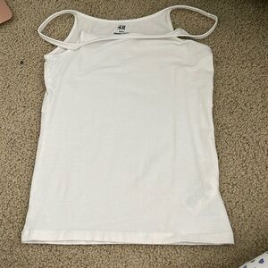 White older HM tank top in a size small and is very stretchy and worn once.